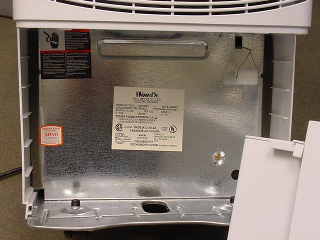 Picture of label behind the removable water
bucket of Recalled Dehumidifier