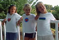 Picture of Three Girls Wearing Liquid-Filled Bubble Patch T-Shirts by Guess?